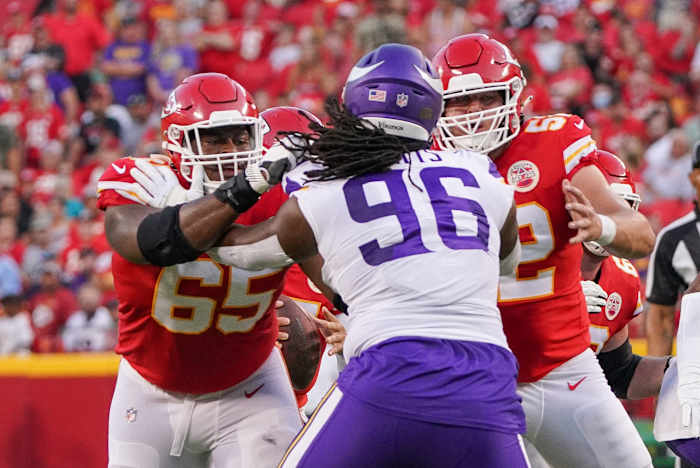 Aug 27, 2021; Kansas City, Missouri, USA; Kansas City Chiefs offensive guard Trey Smith (65) and center Creed Humphrey (52) block Minnesota Vikings defensive tackle Armon Watts (96) during the game at GEHA Field at Arrowhead Stadium. Mandatory Credit: Denny Medley-USA TODAY Sports